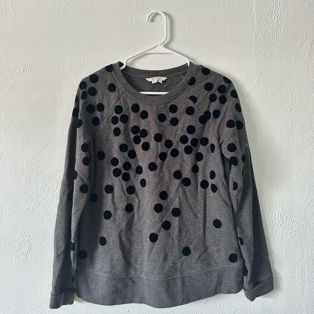 charcoal gray Boden sweatshirt featuring scattered black velvet polka‎ dots
